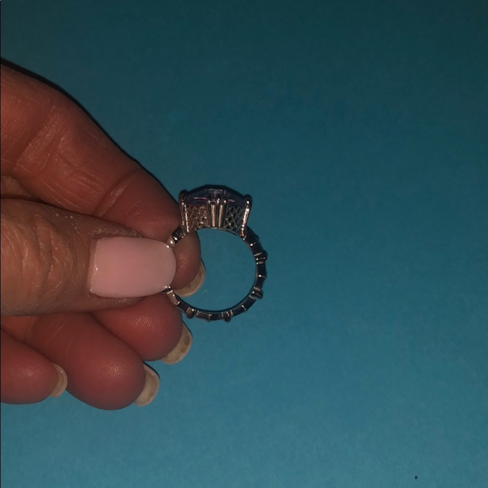 Silver and purple stones ring